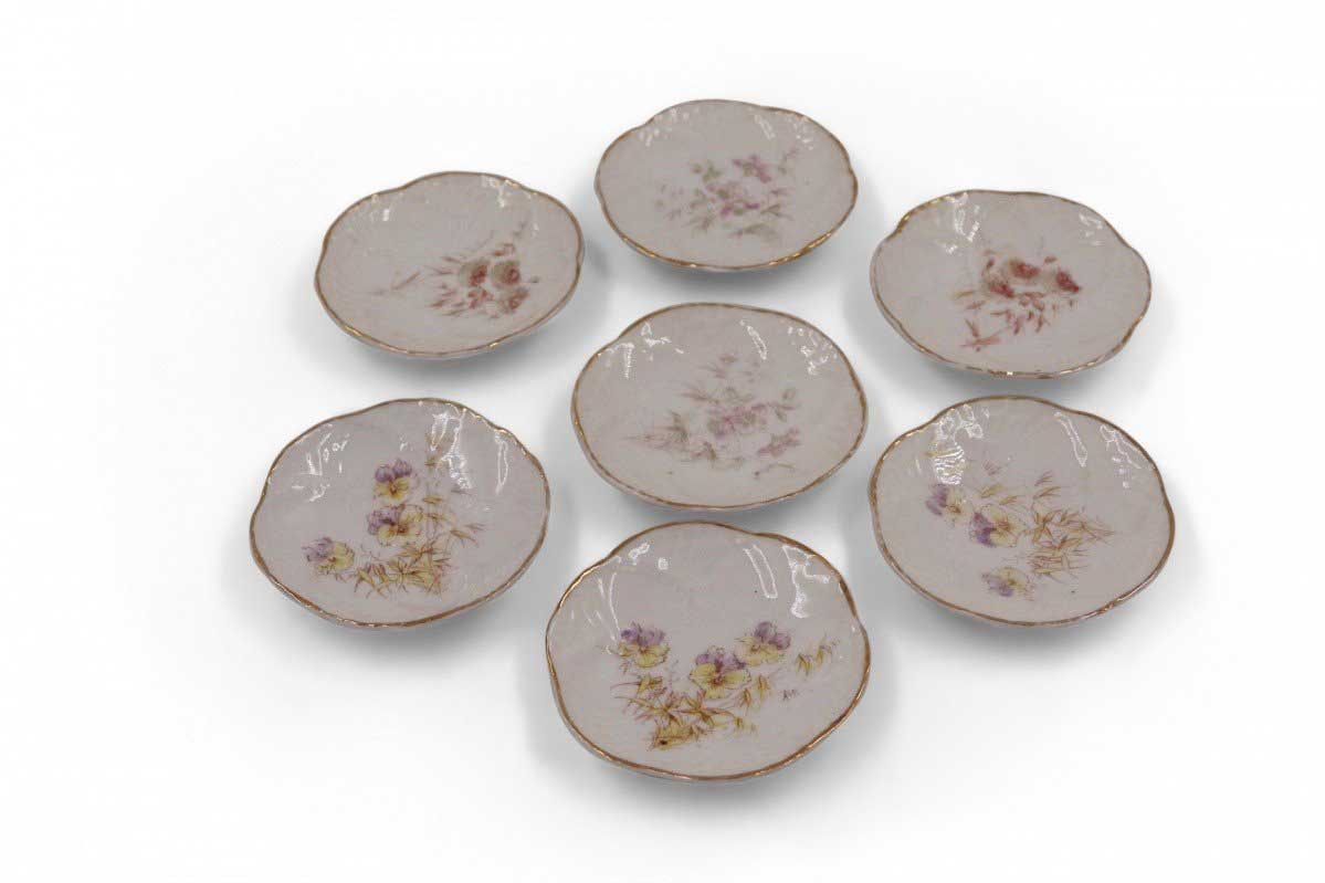 Set of 7 French Victorian Small Gilt Rim Floral Porcelain Plates
