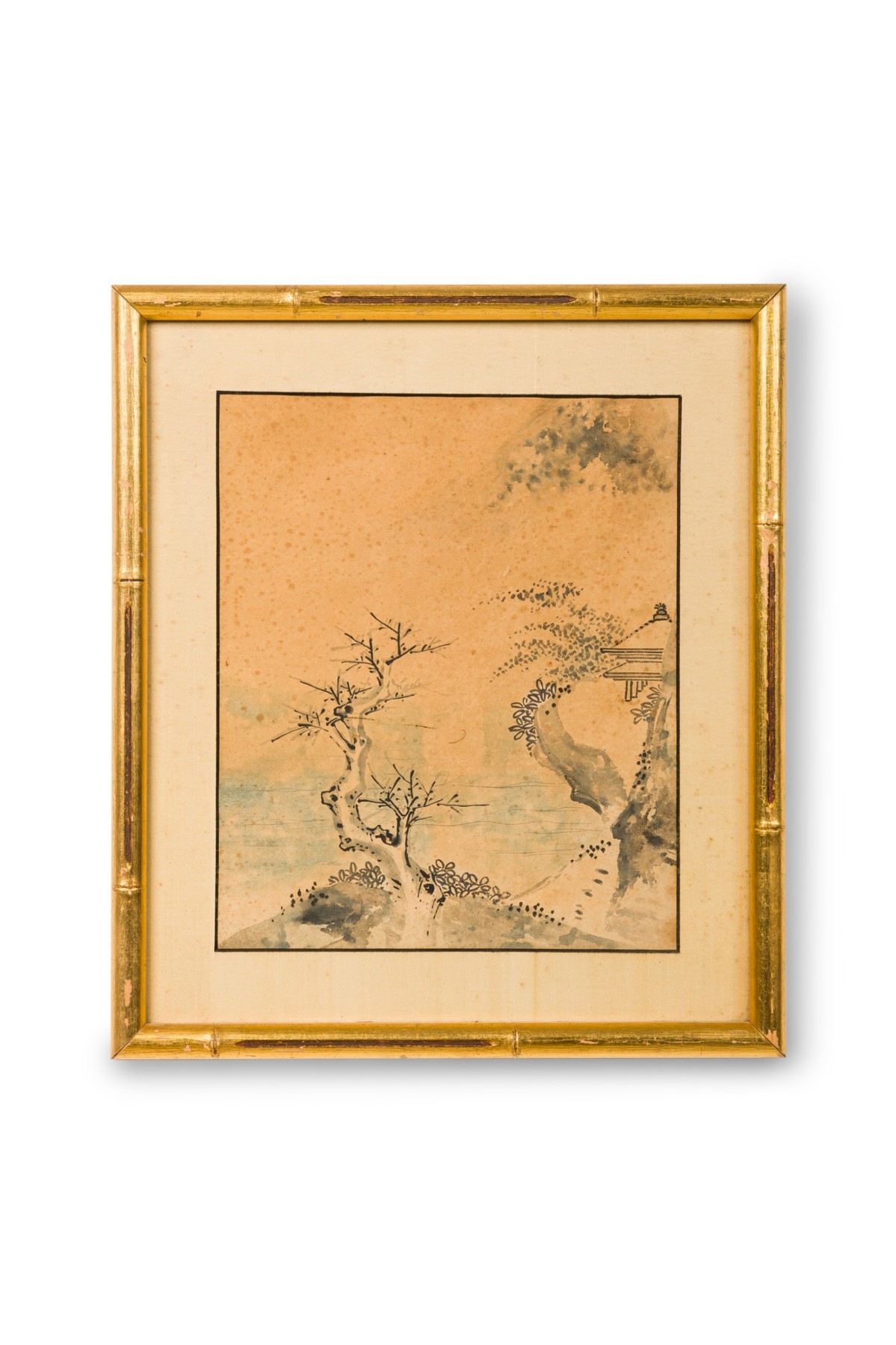 Japanese watercolor of a tree on a hill with no leaves 