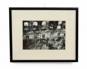 Double exposed black and white photograph of street scene