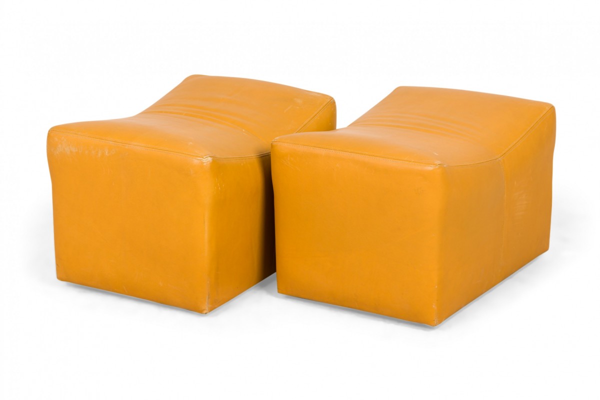 Pair of milo baughman american mid century mustard yellow leather rolling saddle ottomans