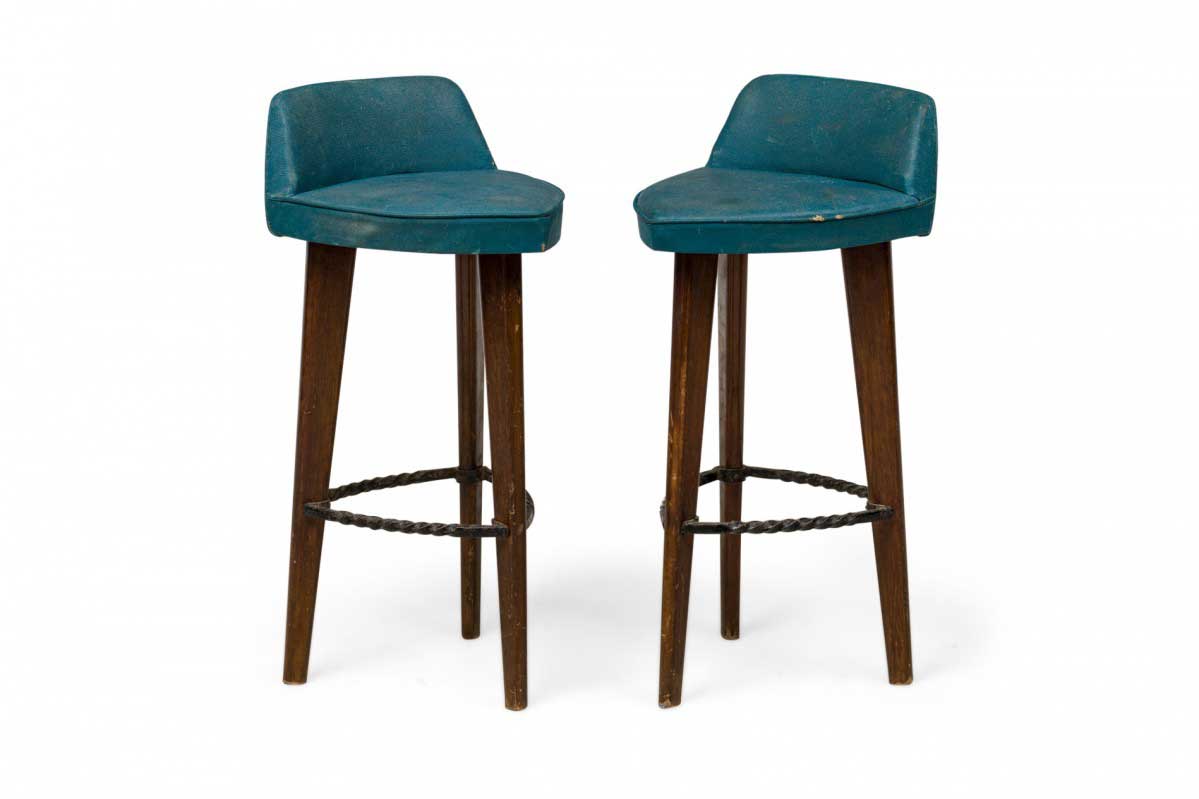 Pair of mid century american triangular blue vinyl upholstered wood bar stools