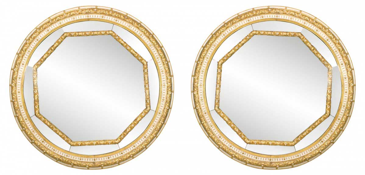 Italian neoclassic white painted and gilt round wall mirrors