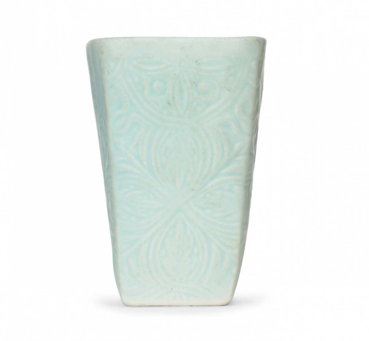 Light green glazed ceramic vase with leaf design