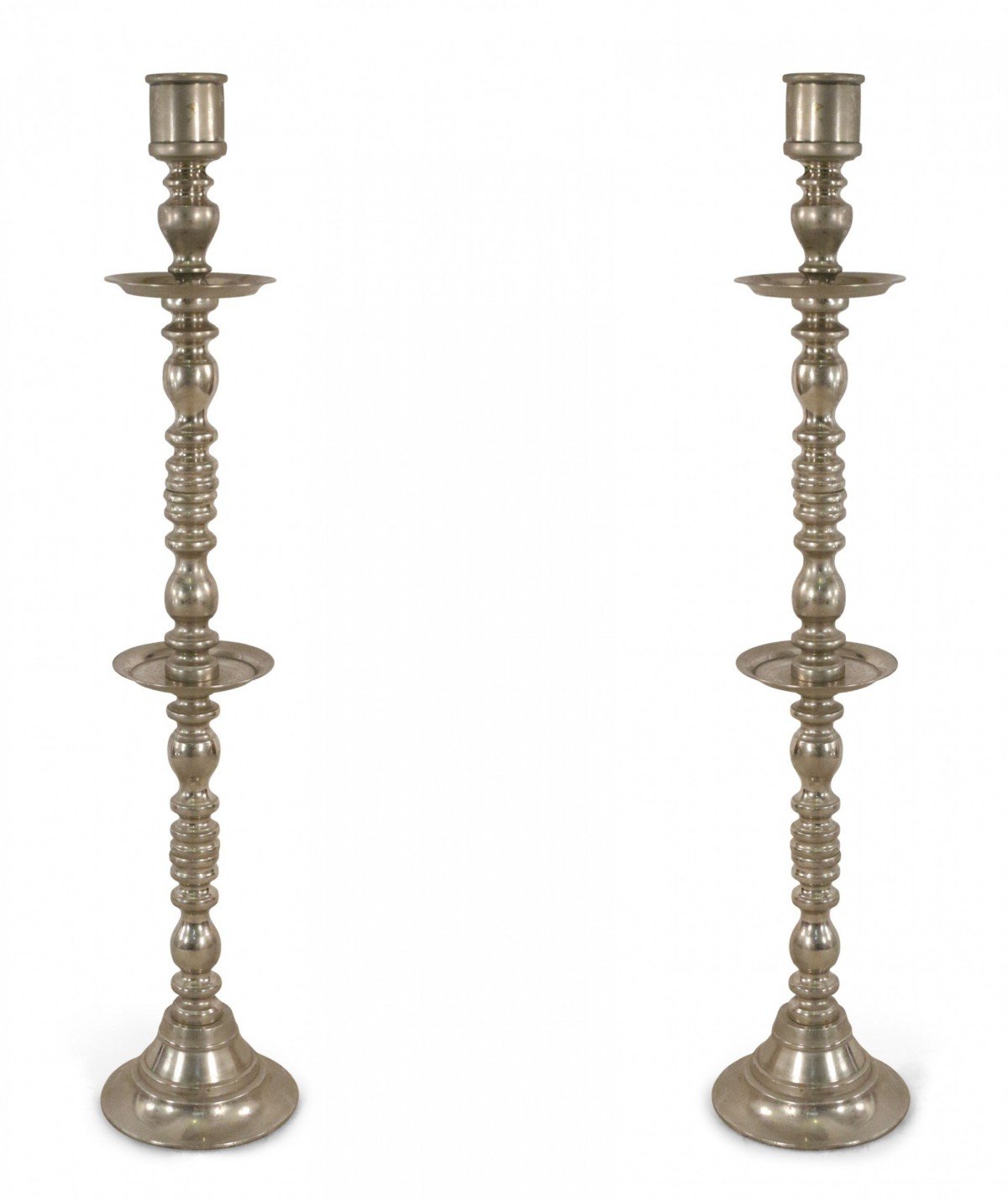 Pair of mid century silver metal turned design floor torchiere candle holders