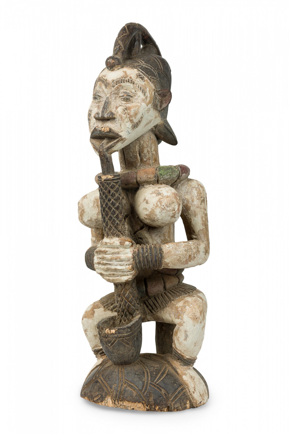 African southern nigeria mid century carved painted wood seated female figure smoking a pipe