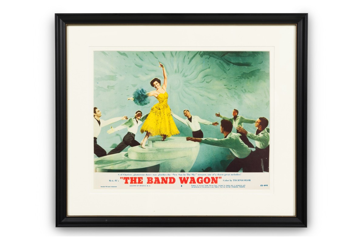 American mid century framed poster of a women in a yellow dress
