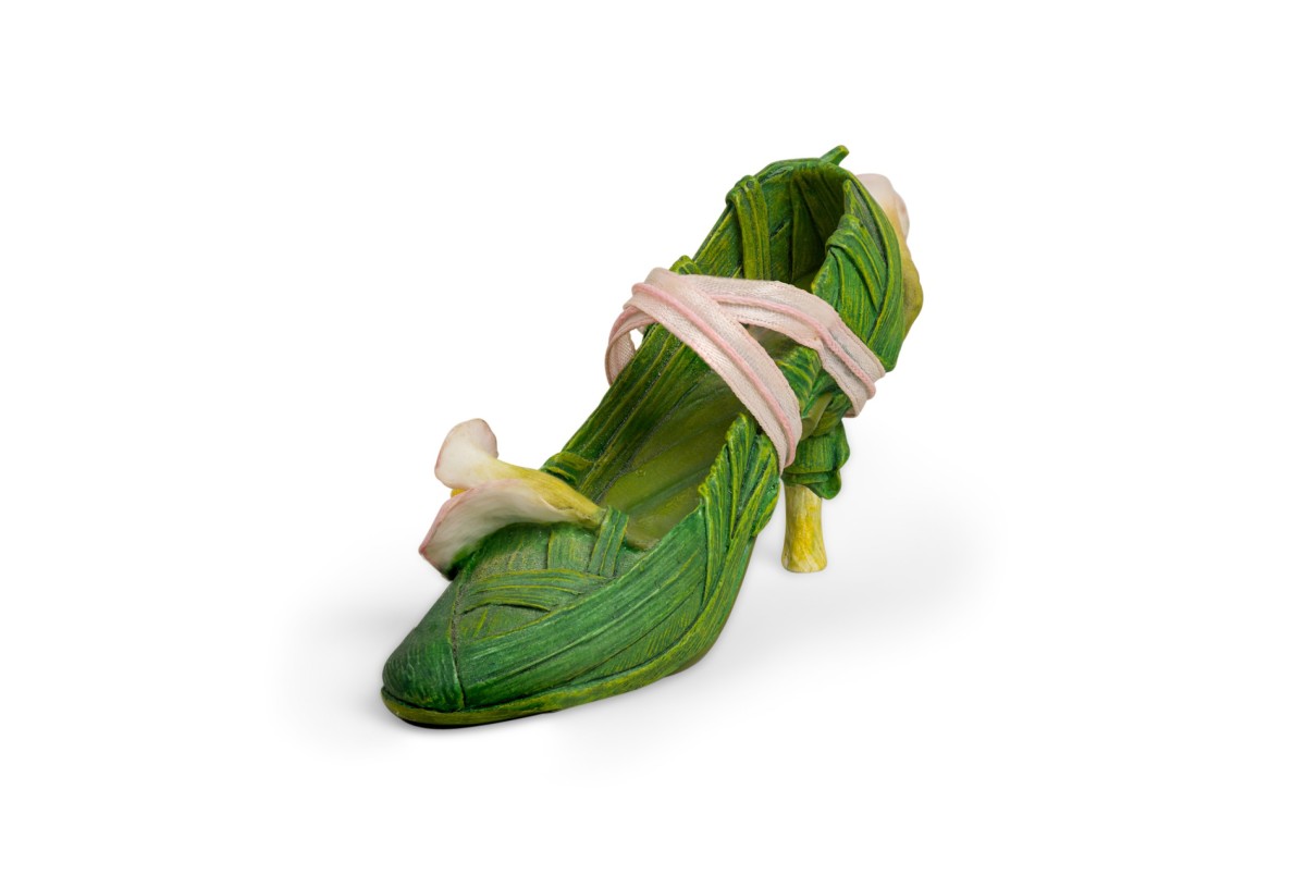 Mid century continental small figurine of a green shoe 