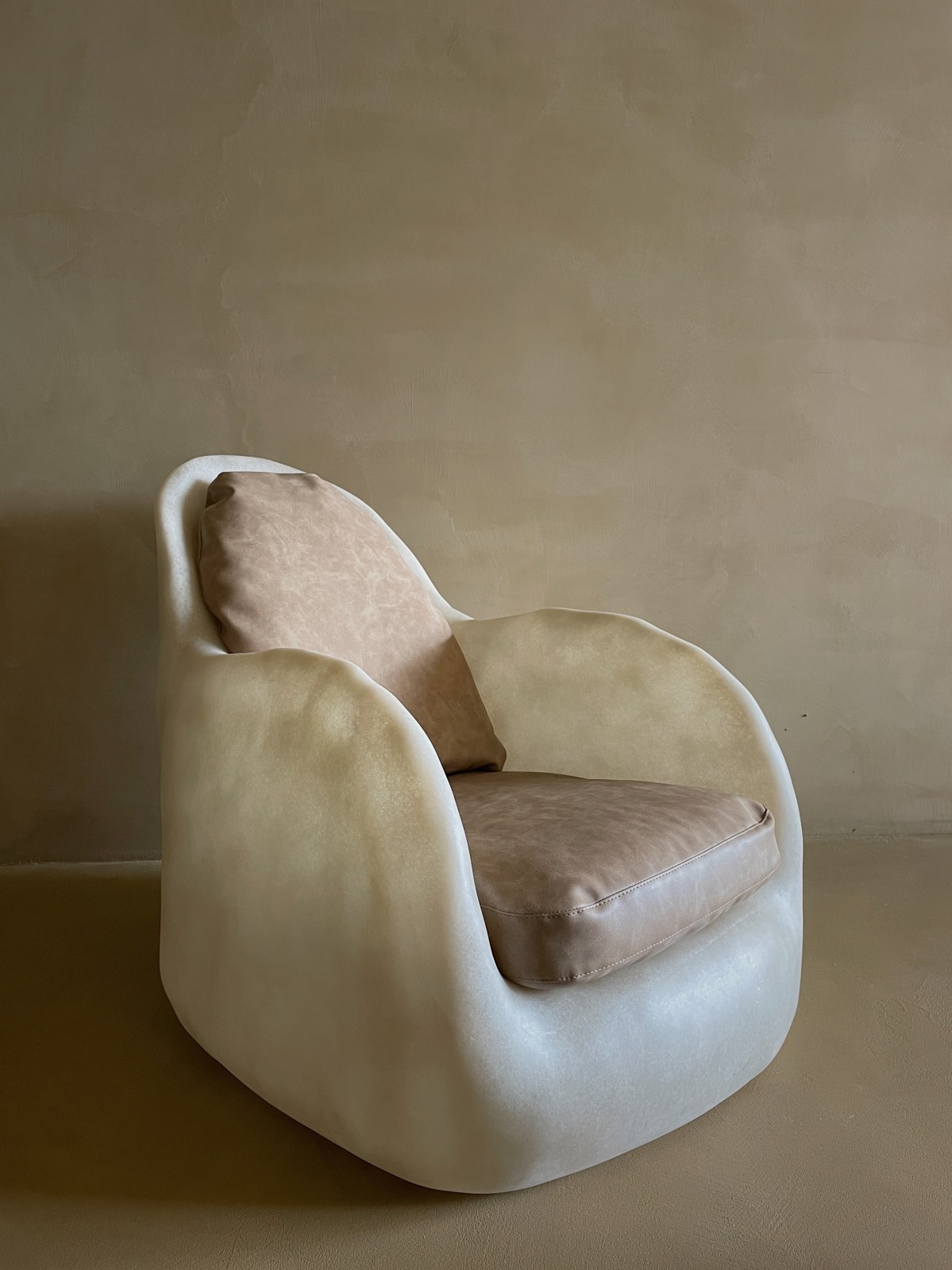 Contemporary amorphous fiberglass armchair