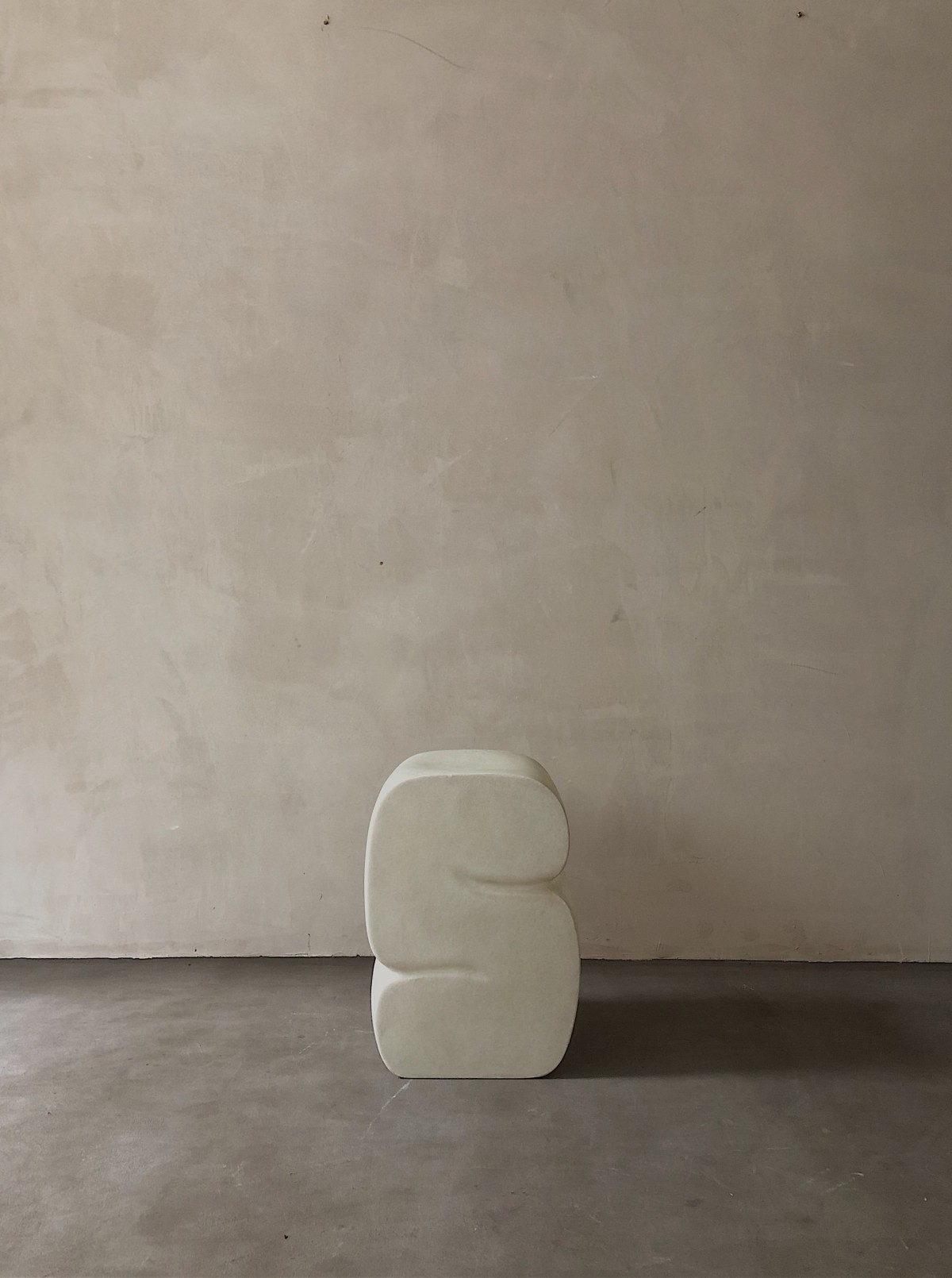 Contemporary beige fiberglass low stool