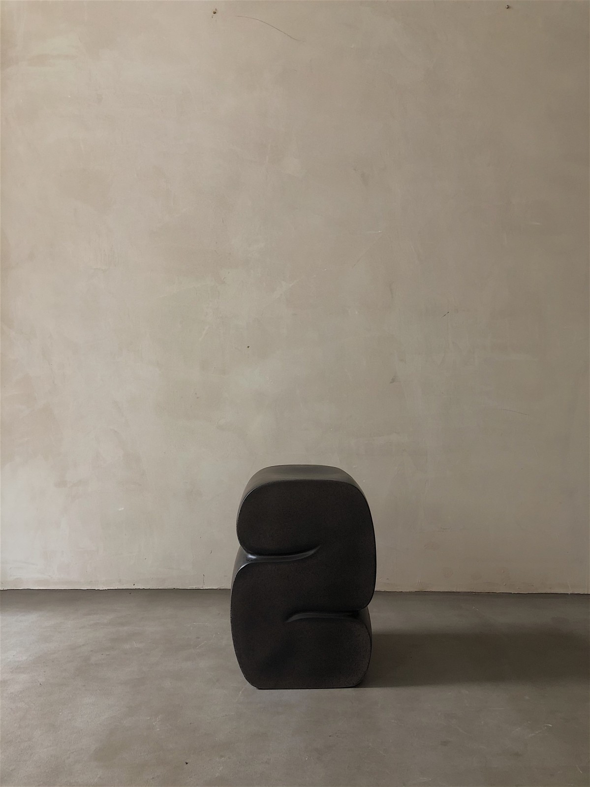 Contemporary brown fiberglass low stool