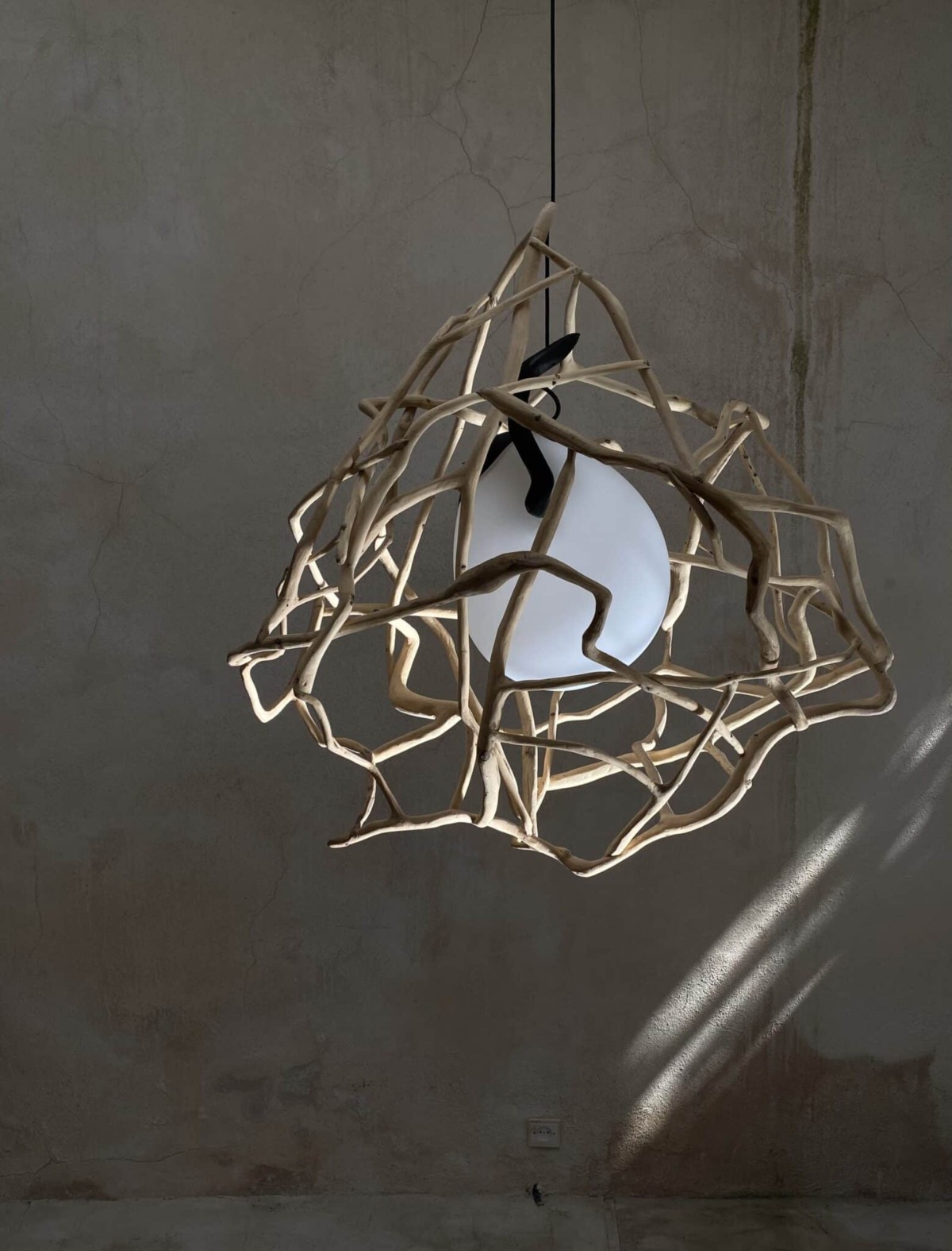 Contemporary planck sculpted oak and blown glass lighting