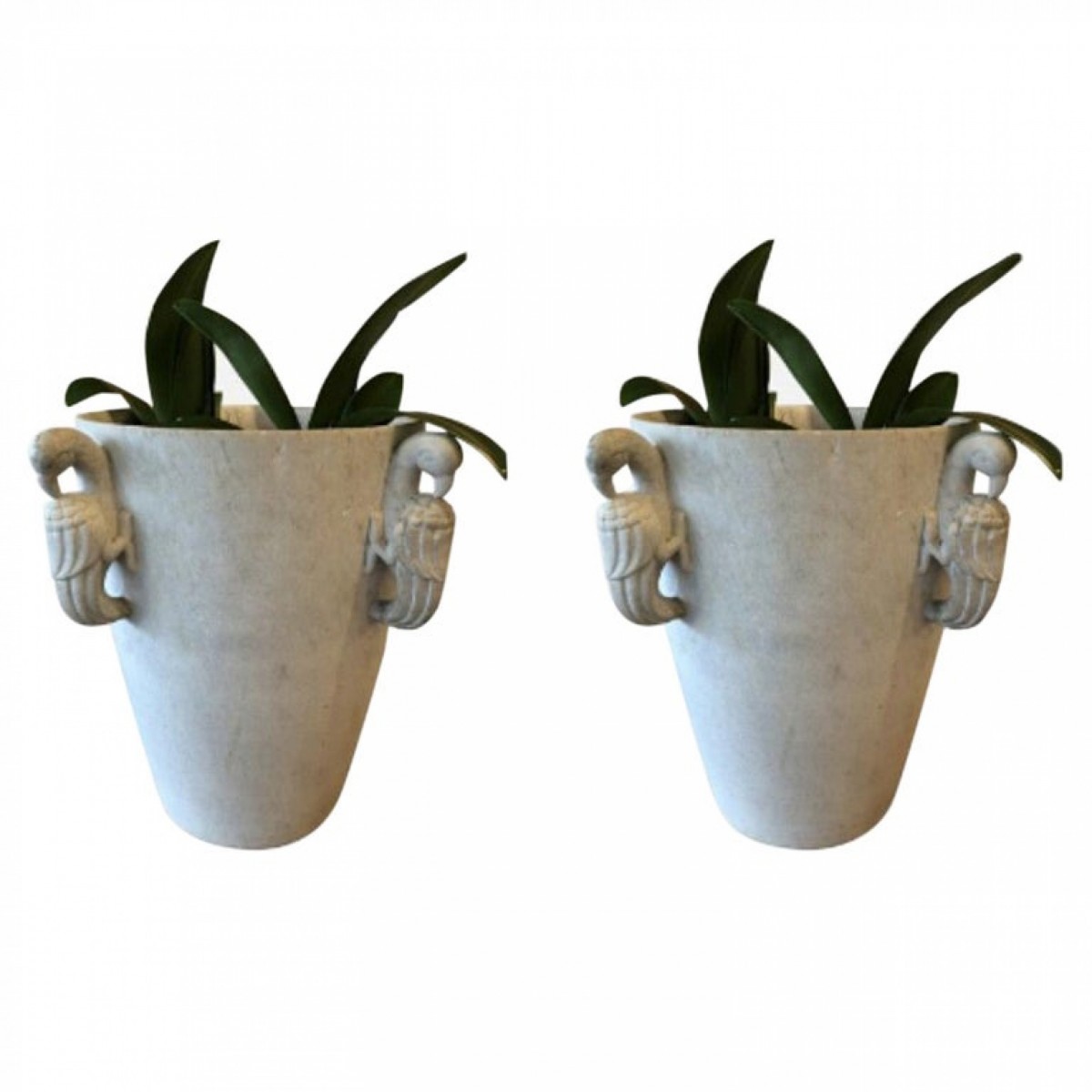 A fine pair of french art deco statuary marble jardiniere having a cone shape with 4 stylized