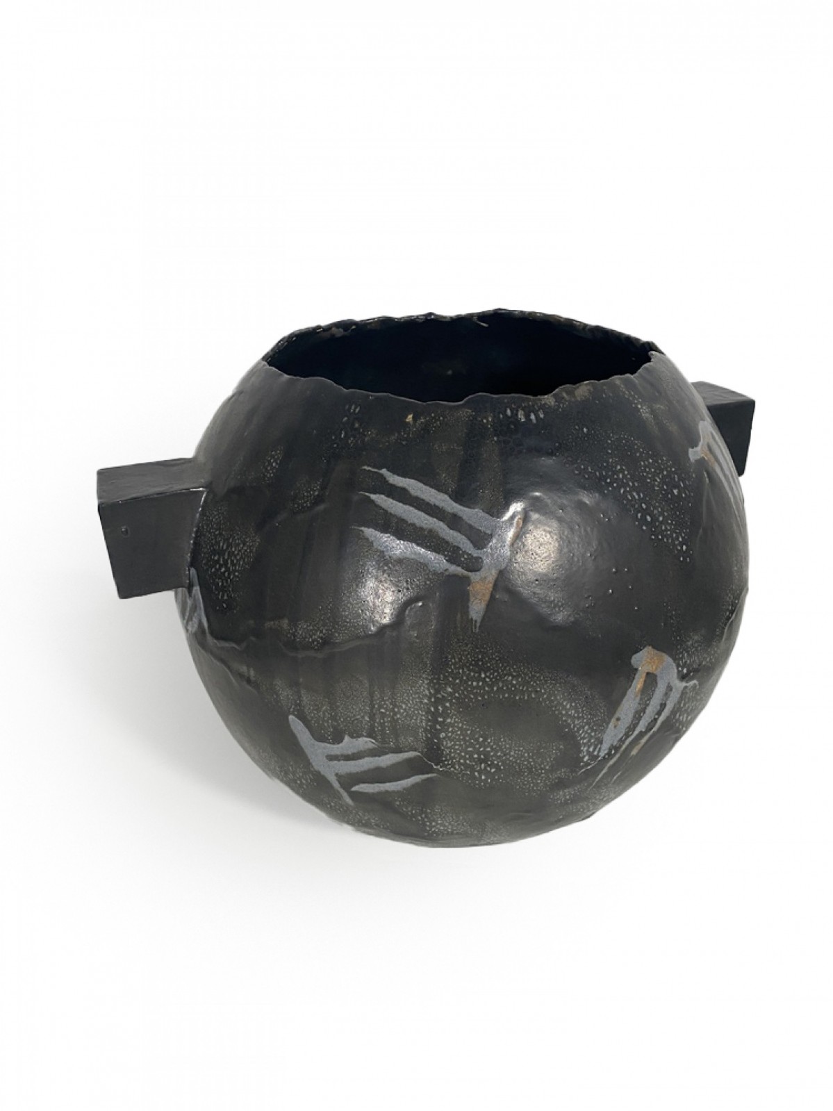 A romanian ceramic vessel with metalic glaze