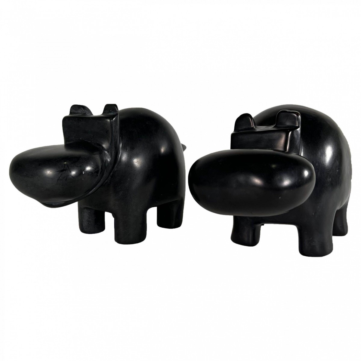 Matched pair of italian marmo negro marble hippos