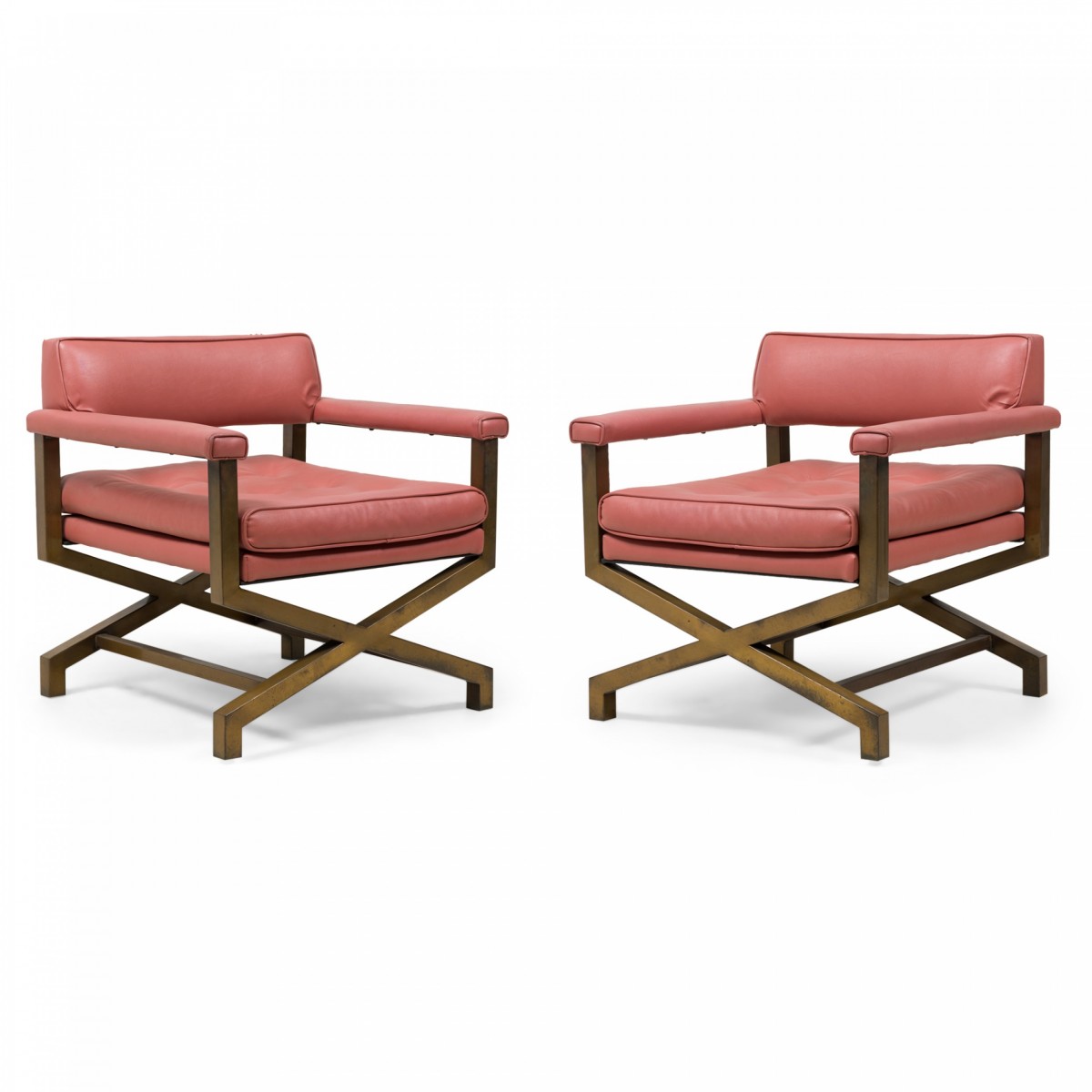 Pair of mid century american upholstered campaign armchairs attributed to tommi parzinger 