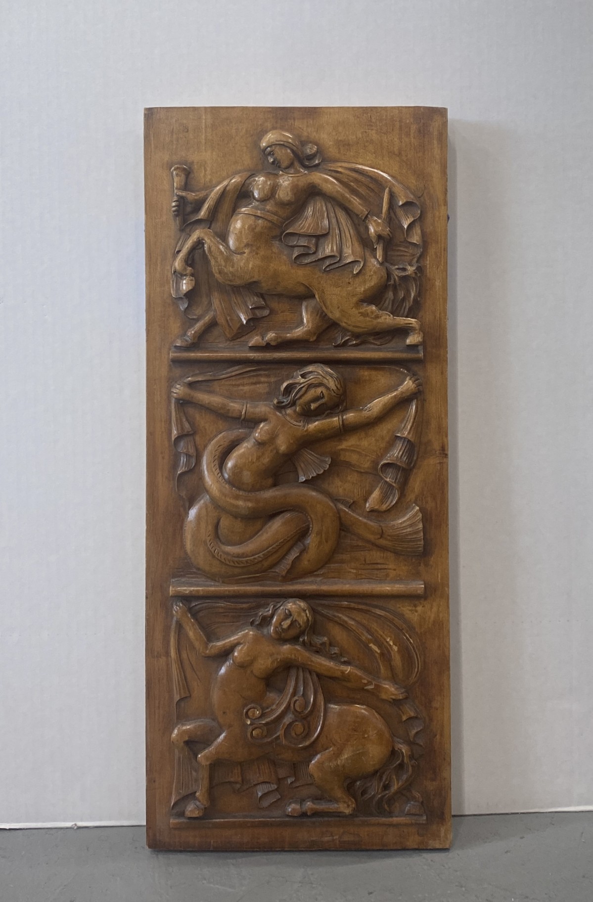 Wall plaque 3 depictions centaur