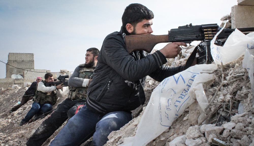 Free Syrian Army rebels fighting against Assad militias on the outskirts of the northwestern city of Maraat al-Numan, Idlib - Syria. Source: Freedom House.