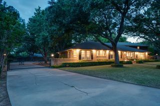 Night Time View Exterior With Gate 