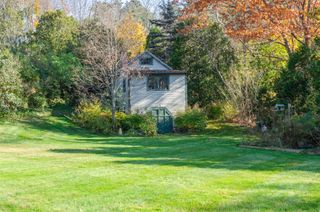 Rear of detached 2 story shop/garage