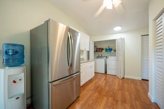 Laundry Room with Extra Refrigerator and Lots of Closet Space