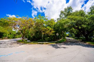 Walled Corner Lot between 17th Ave and Micanopy Ave