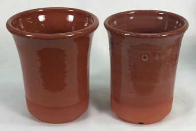 A mug. Before and after kiln. Using electric brown clay and smokey