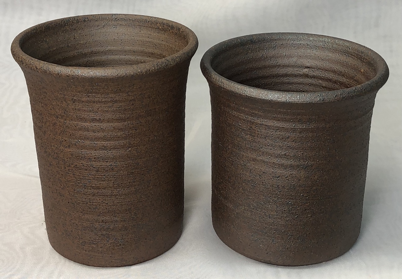 Two vessels made from a vitreous metallic reduction stoneware