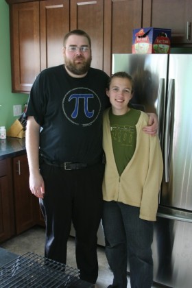 Homeowners in swanky new kitchen