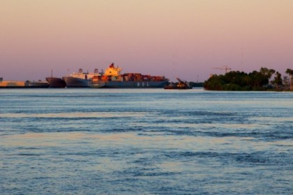 Barge rounding the bend in the Mississippi