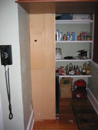 Building the divider between the shelves and fridge