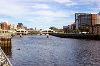 Walking along the River Clyde in Glasgow, view of Squiggly Bridge