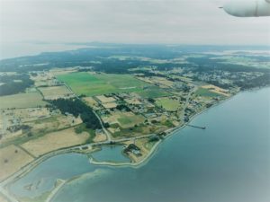 Image: Penn Cove from the air, looking at Kennedy Lagoon (NC-18.1). Photo Credit: Darcy Bird