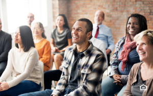 Audience members at a conference