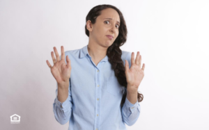 Tenant holding up hands because landlord has invaded privacy