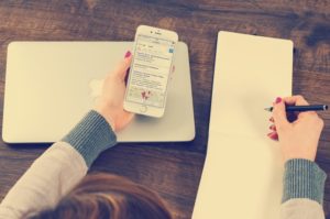 Woman Prepping Notes About a Local Listing