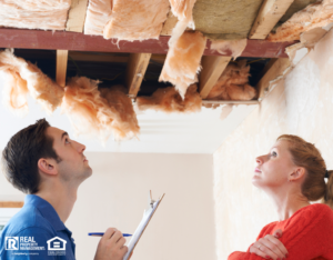 Contractor and Property Owner Inspecting Roof Damage