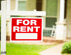 Wellsville Rental Property with a “For Rent” Sign in the Front Yard