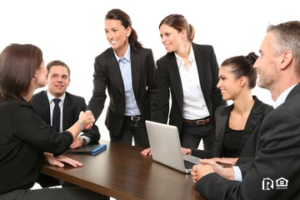 A Group of Professionals Conducting a Meeting