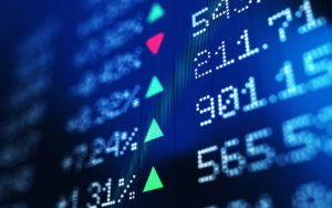 Financial data analysis graph showing stock market trends on a trading board