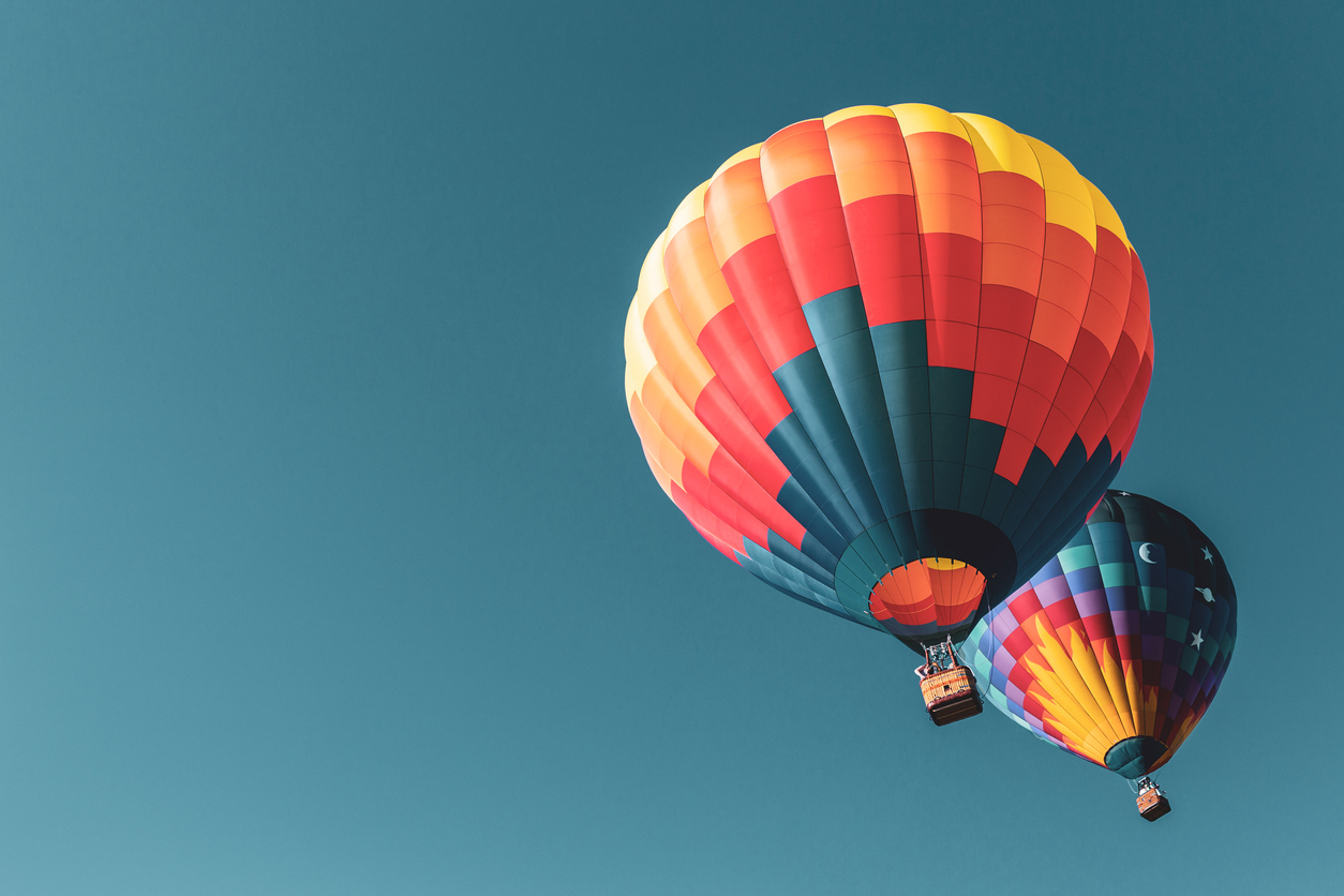 Colorful hot air balloons flying in Michigan