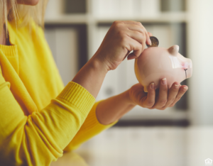 Gaithersburg Woman Saving Change in a Piggy Bank