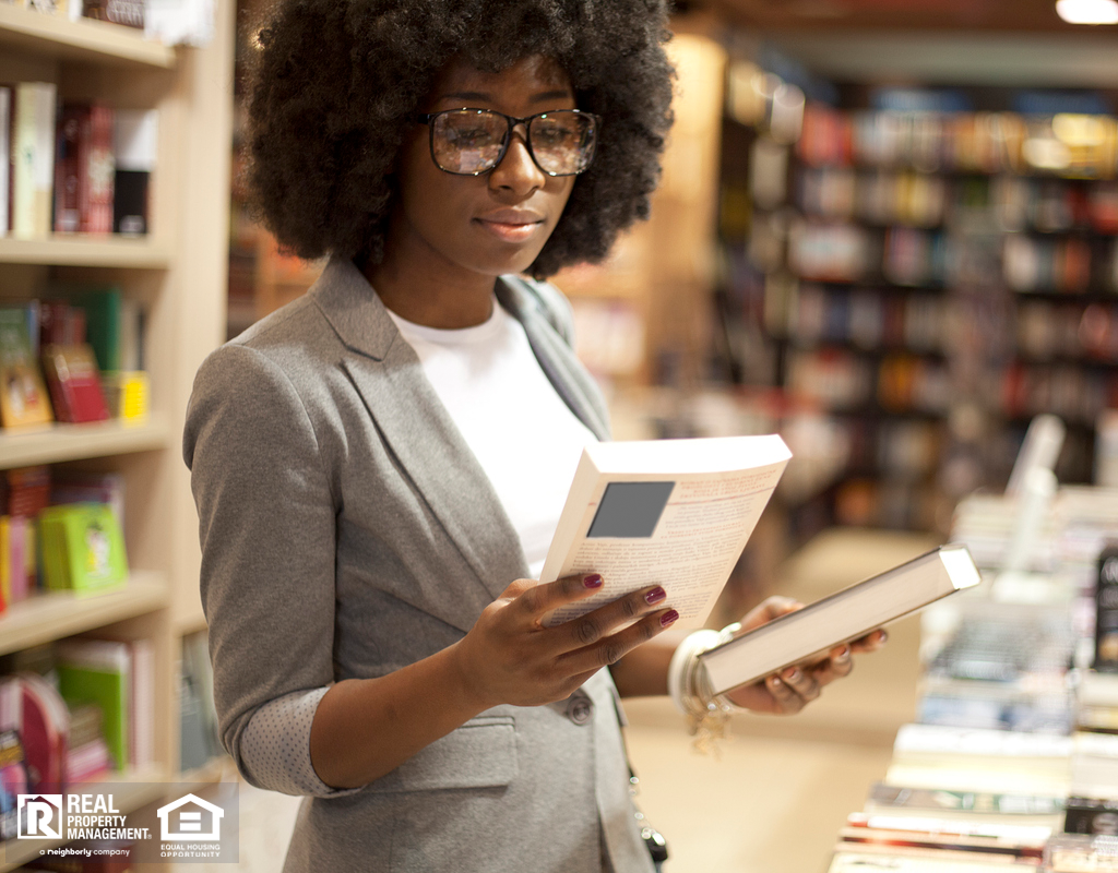 Business Woman Buying Book at Book Store