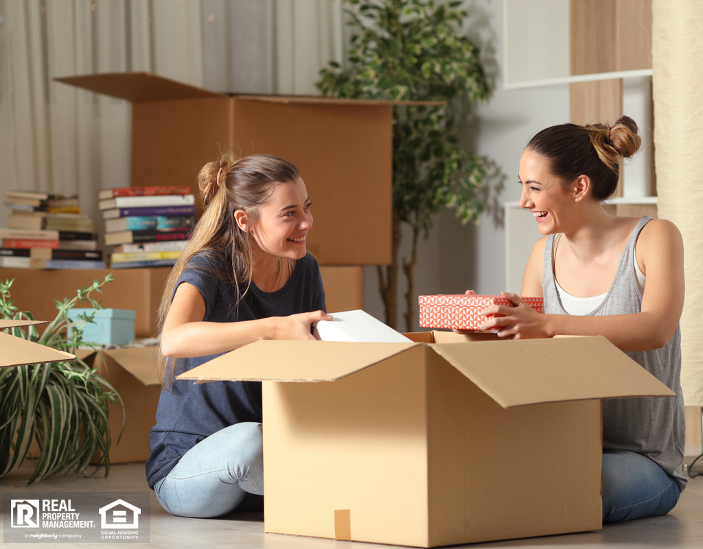 Roommates Unboxing Belongings in Copper River Rental Home