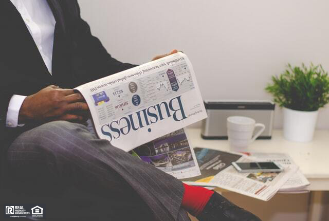 A Texas Real Estate Investor Reading the Business Section of a Newspaper