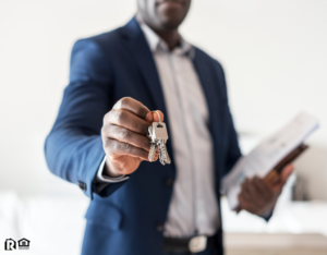 Goldman Valley Real Estate Investor Holding Out a Set of Keys
