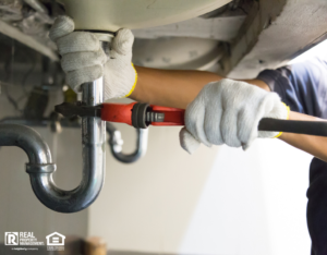 Local Plumber Fixing the Sink at a Perrysburg Rental Property