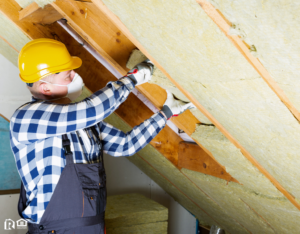 Maintenance Man Working on Insulation in the Attic of a Newbury Park Rental Home