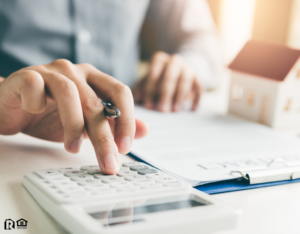 Miami Real Estate Investor Crunching Numbers to Determine his ROI