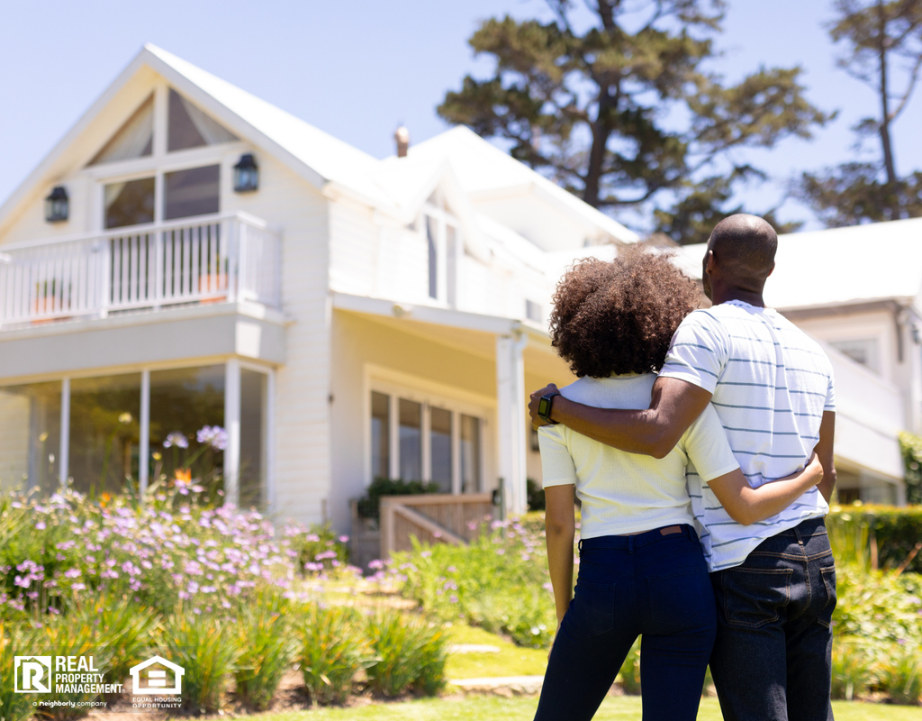Couple Embracing and Looking at their New Washington Corridor Rental Home
