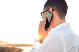 Rear View of a Man Talking on a Cell Phone